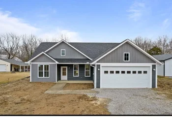 Charming Country Craftsman with Wraparound Porch – 2,345 Sq Ft of Cozy Comfort