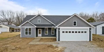 Charming Country Craftsman with Wraparound Porch – 2,345 Sq Ft of Cozy Comfort