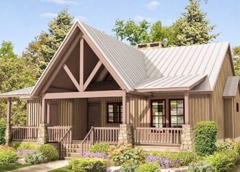 Country Cabin with Vaulted Front Porch and a 2-Sided Fireplace